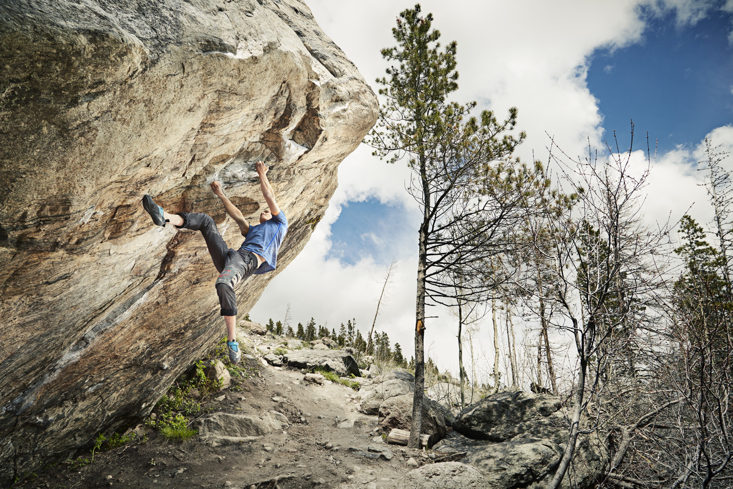 Caius Rickard climbing the Veritas Boulder
